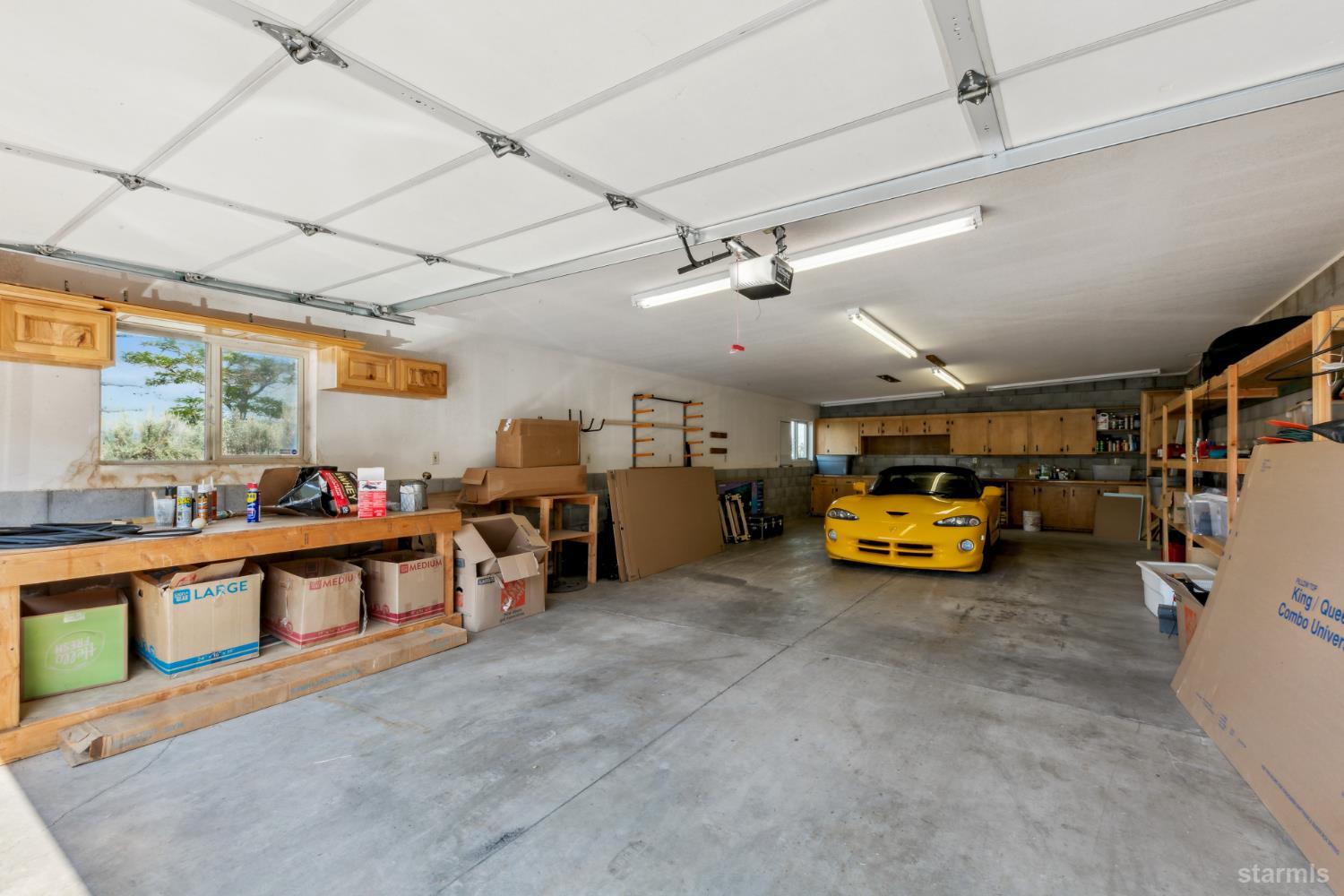1299 Kingsbury Grade Road Gardnerville, NV 89460 - Photo 30 of 37 a view of a garage with parked cars
