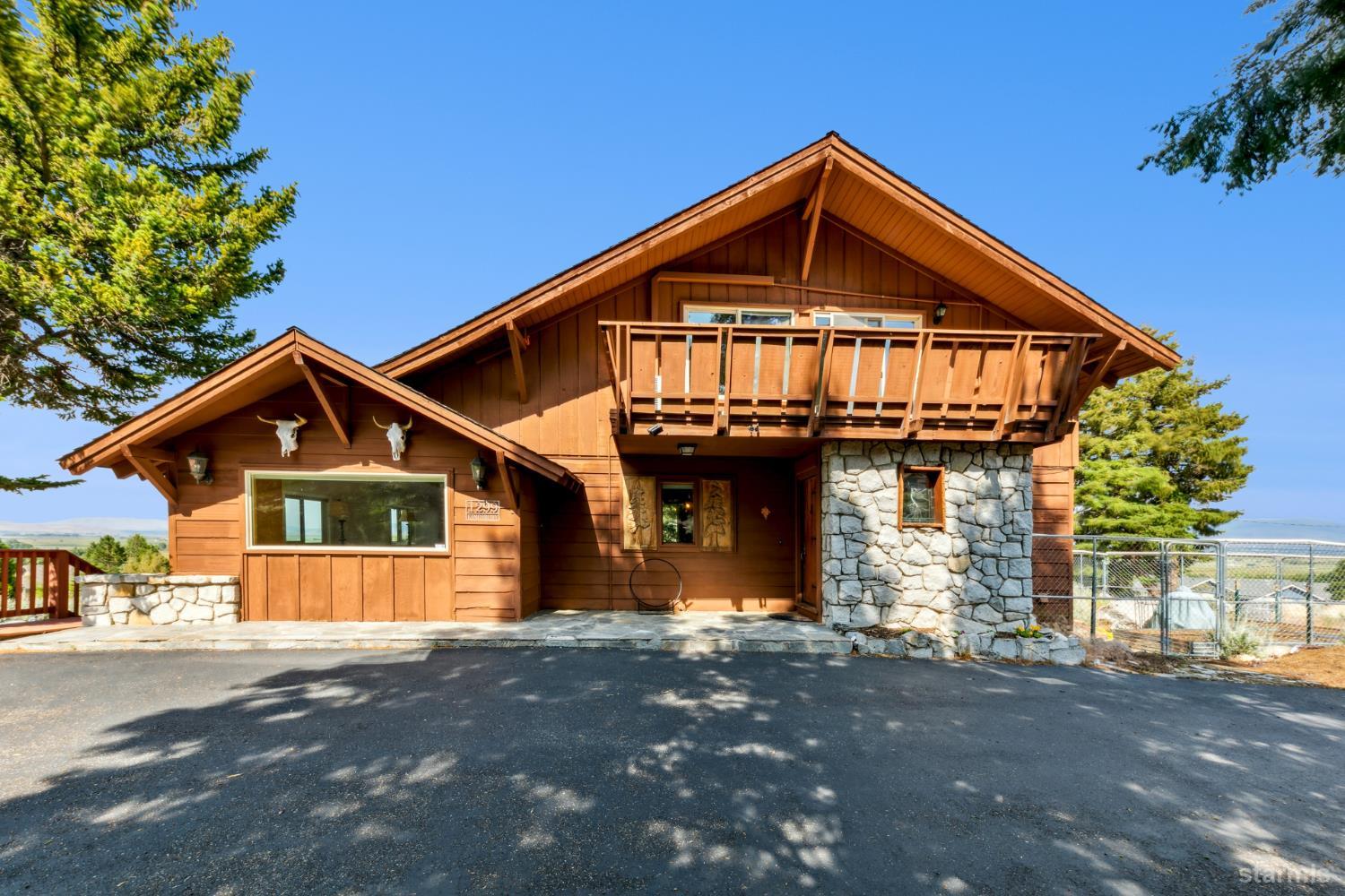 1299 Kingsbury Grade Road Gardnerville, NV 89460 - Photo 5 of 37 a front view of a house with a yard