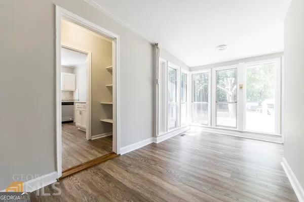 a view of entryway with wooden floor