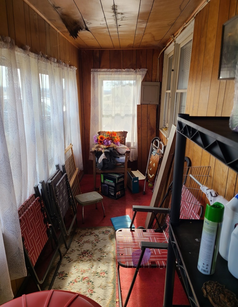 905 Walton Road Dixon, IL 61021 - Photo 15 of 18 a living room with furniture and a window