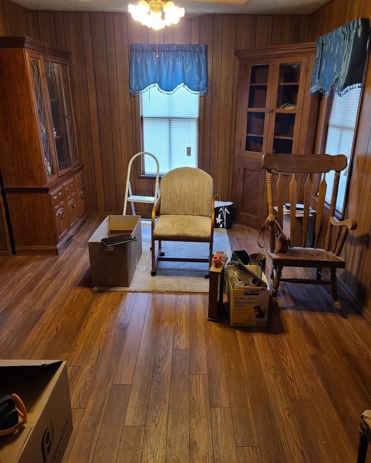 905 Walton Road Dixon, IL 61021 - Photo 5 of 18 a living room with furniture and a wooden floor
