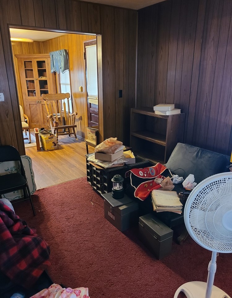 905 Walton Road Dixon, IL 61021 - Photo 6 of 18 a bedroom with furniture and a large window