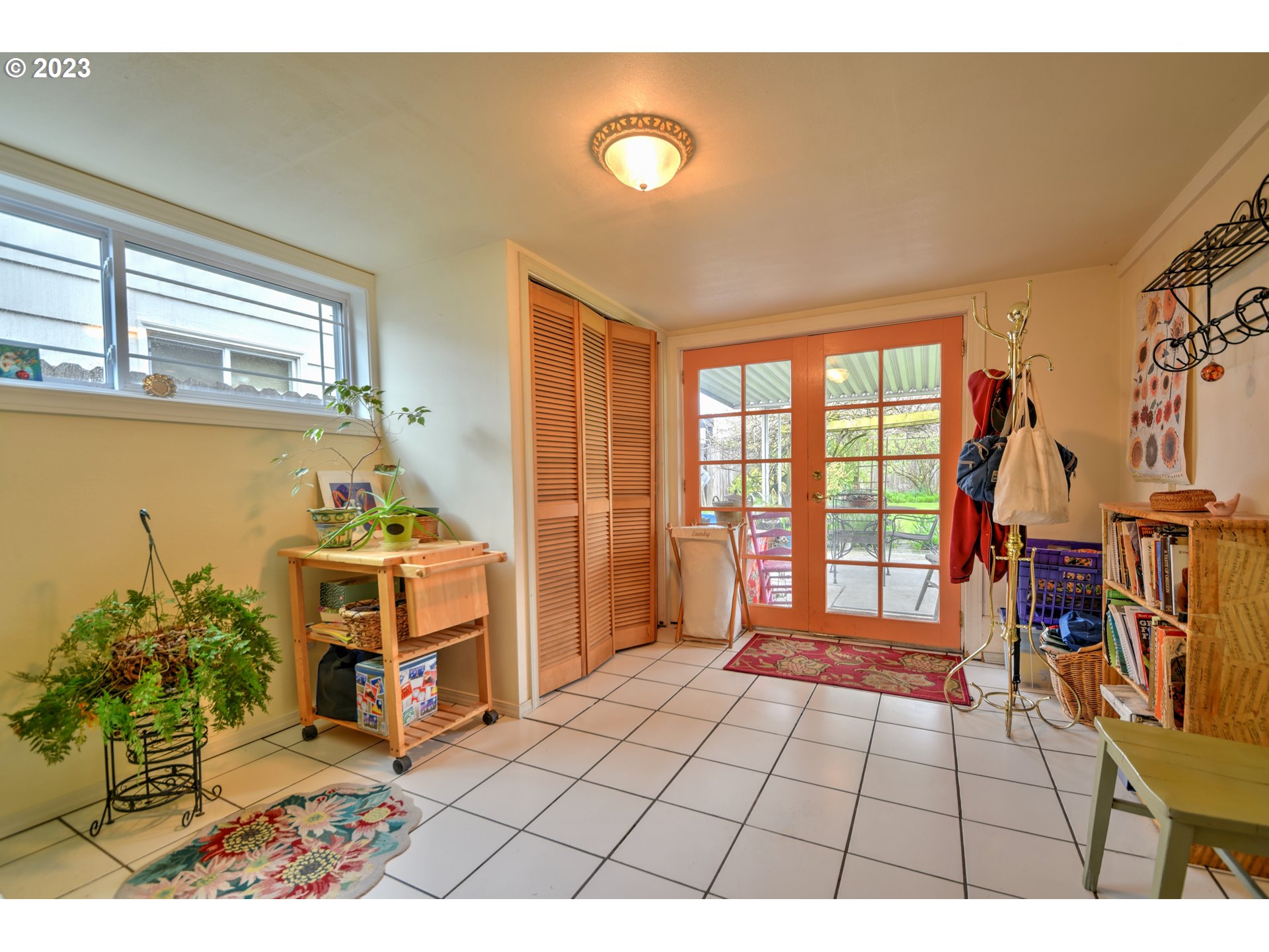 1267 N Street Springfield, OR 97477 - Photo 12 of 27 a view of an empty room with furniture and a window