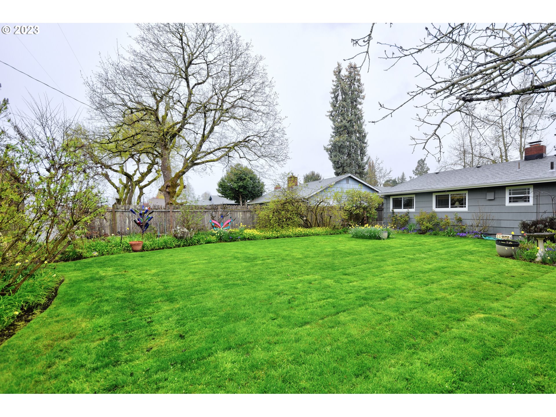 1267 N Street Springfield, OR 97477 - Photo 27 of 27 a view of house with backyard and garden
