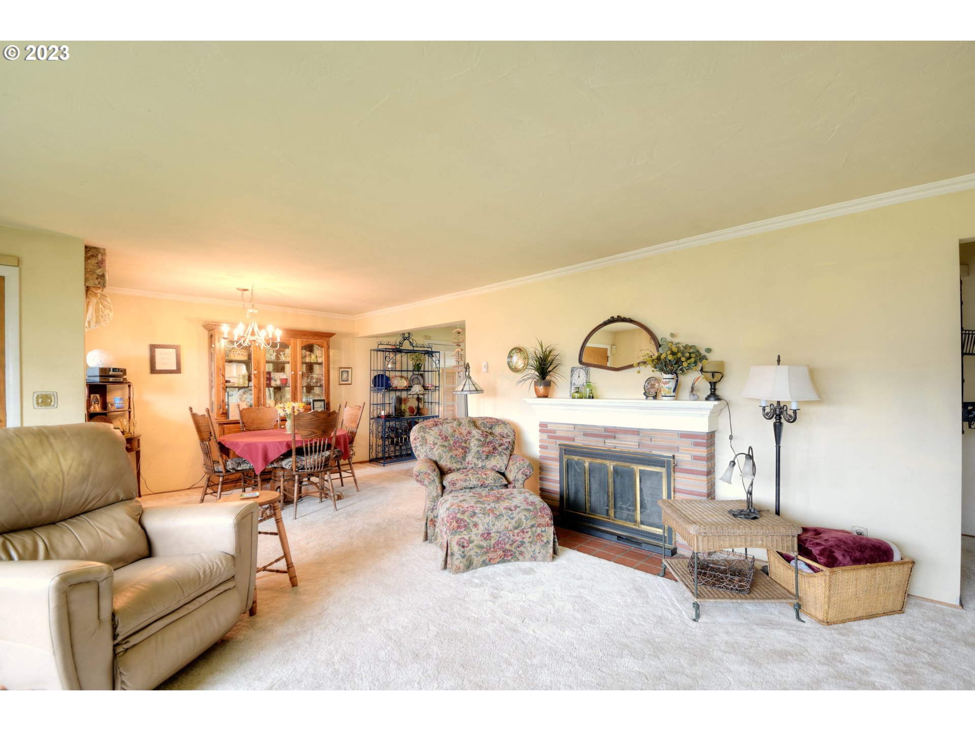 1267 N Street Springfield, OR 97477 - Photo 4 of 27 a living room with furniture and a fireplace