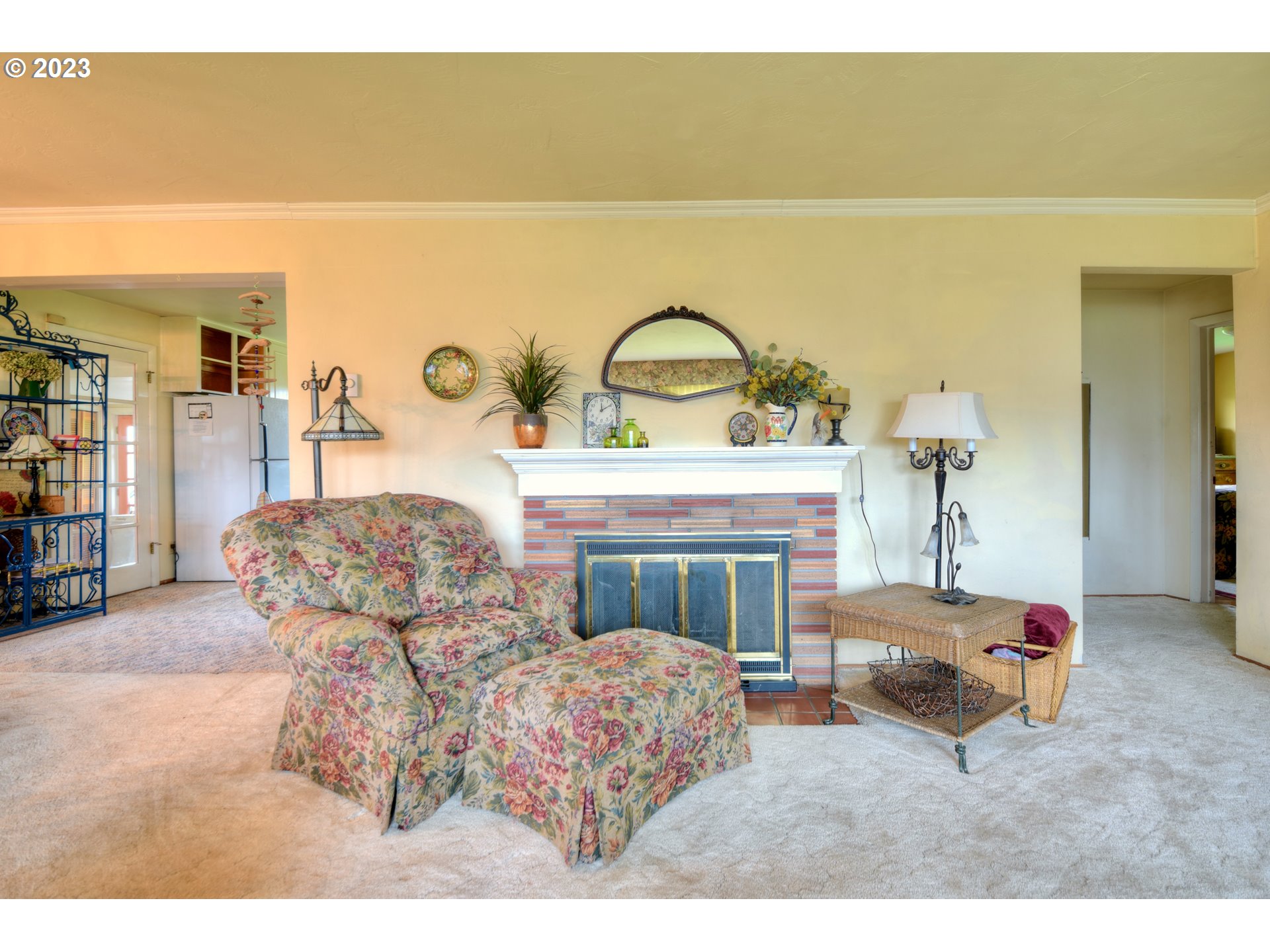 1267 N Street Springfield, OR 97477 - Photo 6 of 27 a living room with furniture and a fireplace