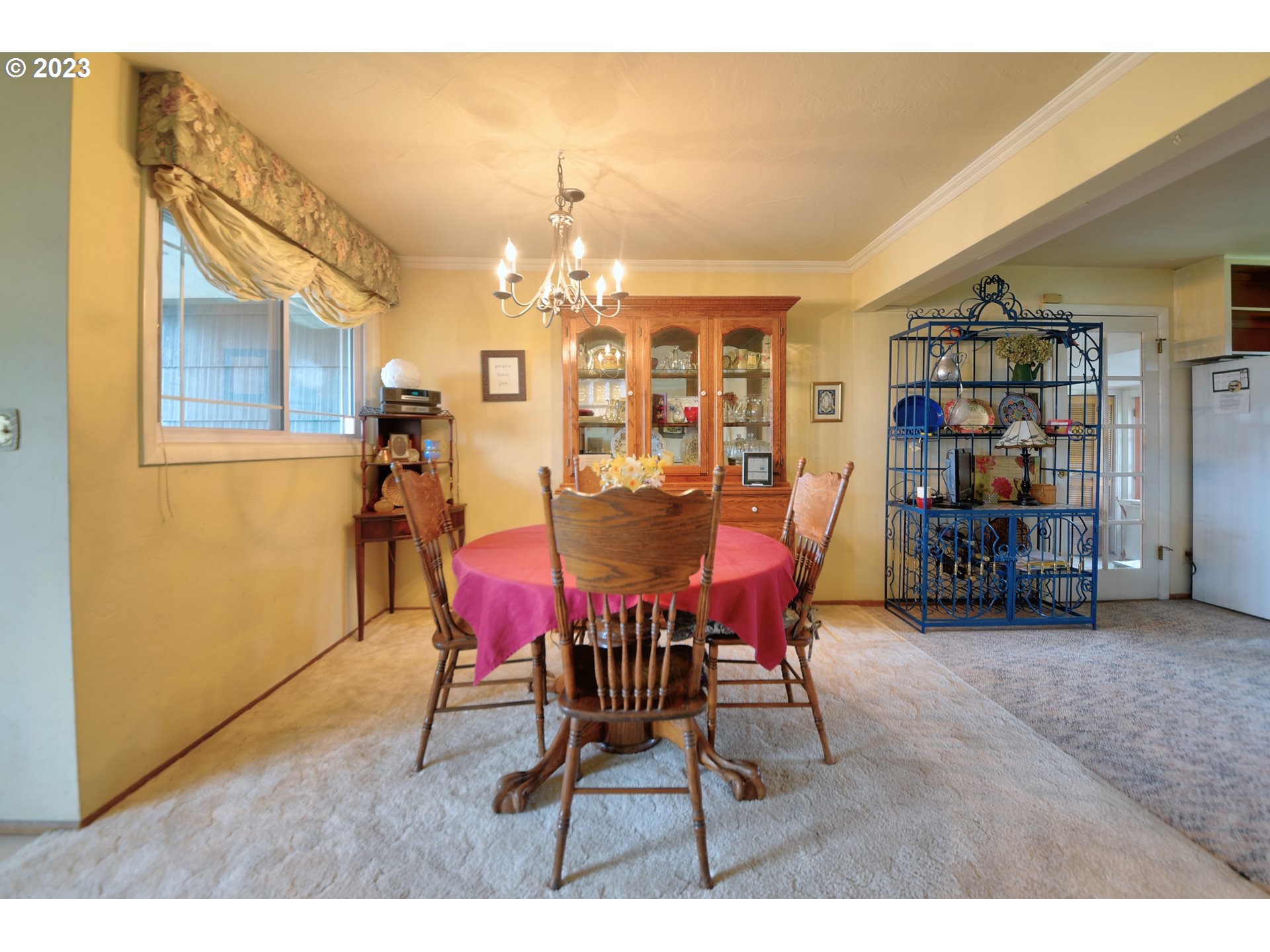 1267 N Street Springfield, OR 97477 - Photo 7 of 27 a dining room with furniture and chandelier