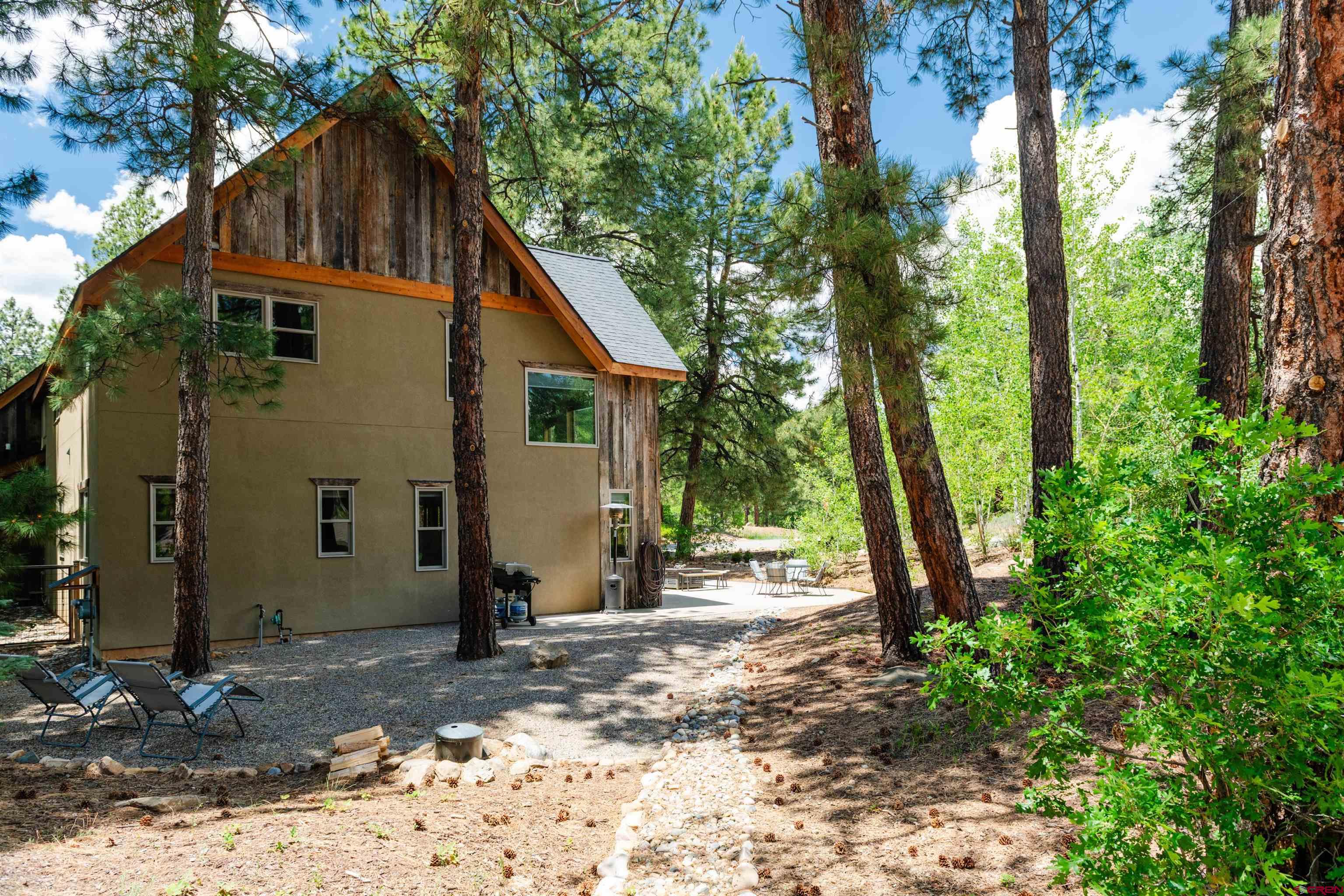 15 Edgemont Way Durango, CO 81301 - Photo 14 of 35 a view of a house with a yard