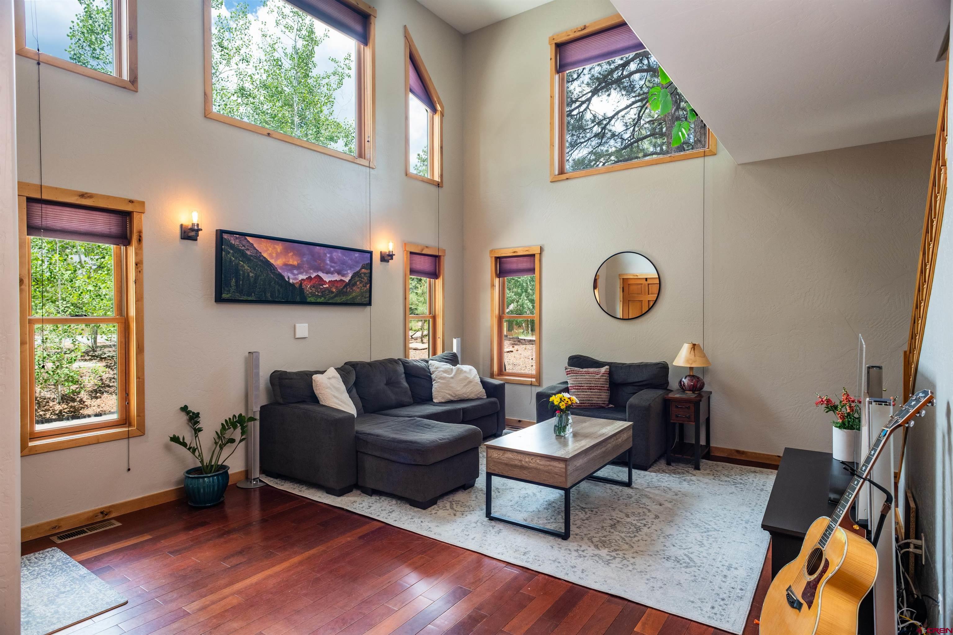 15 Edgemont Way Durango, CO 81301 - Photo 22 of 35 a living room with furniture and a flat screen tv
