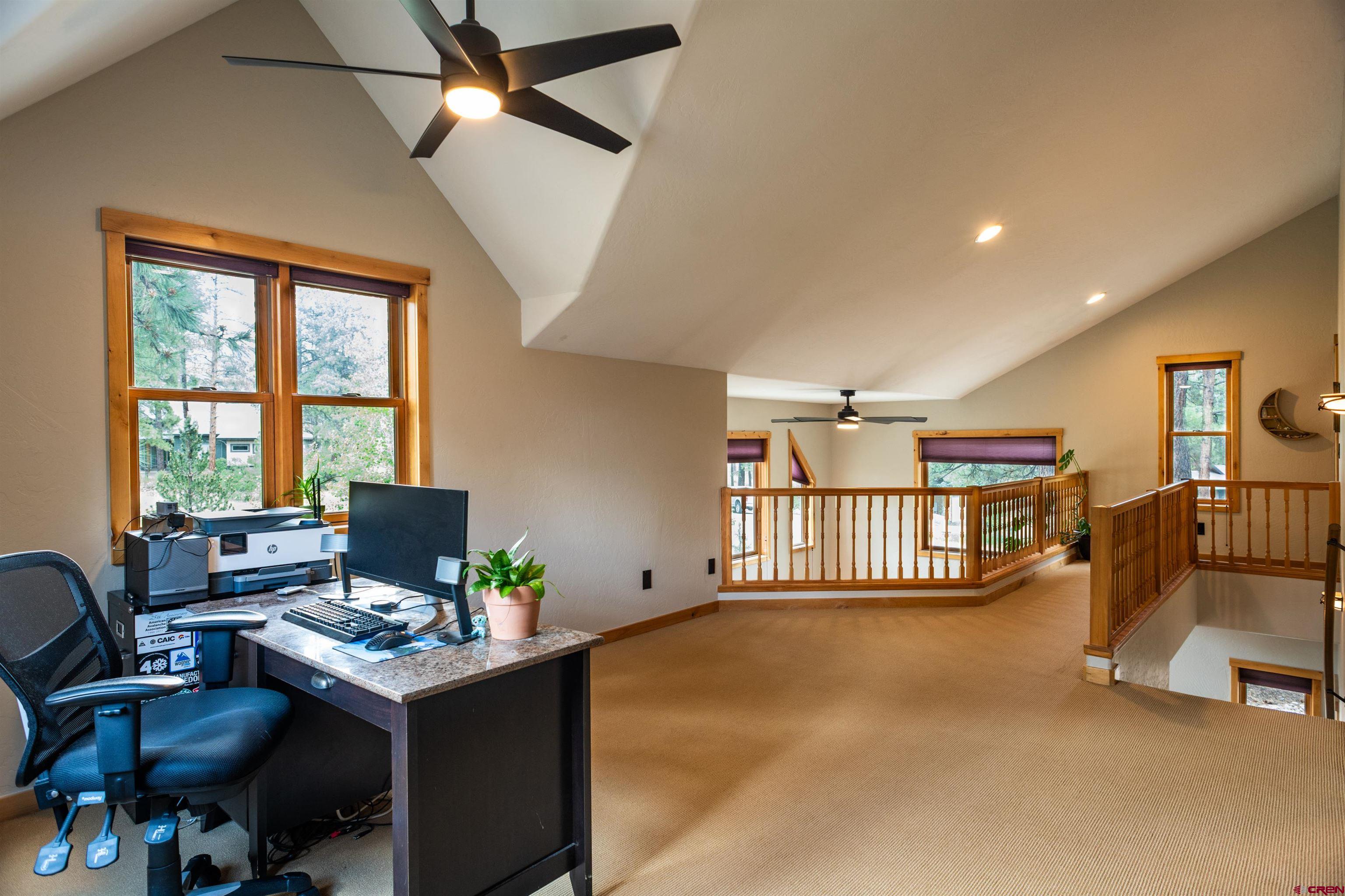 15 Edgemont Way Durango, CO 81301 - Photo 30 of 35 a livingroom with workspace and a window