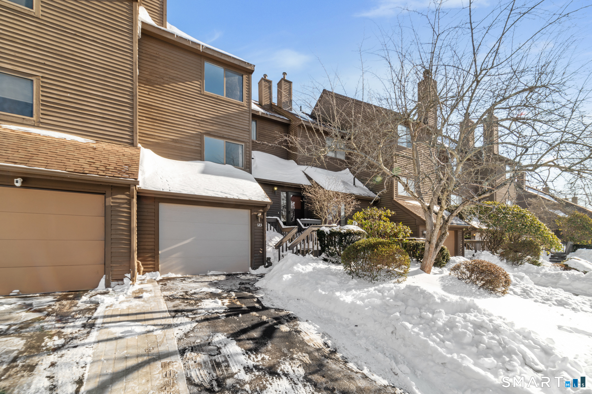 900 Mix Avenue, Unit 123 Hamden, CT 06514 - Photo 1 of 32 a view of a house with a yard