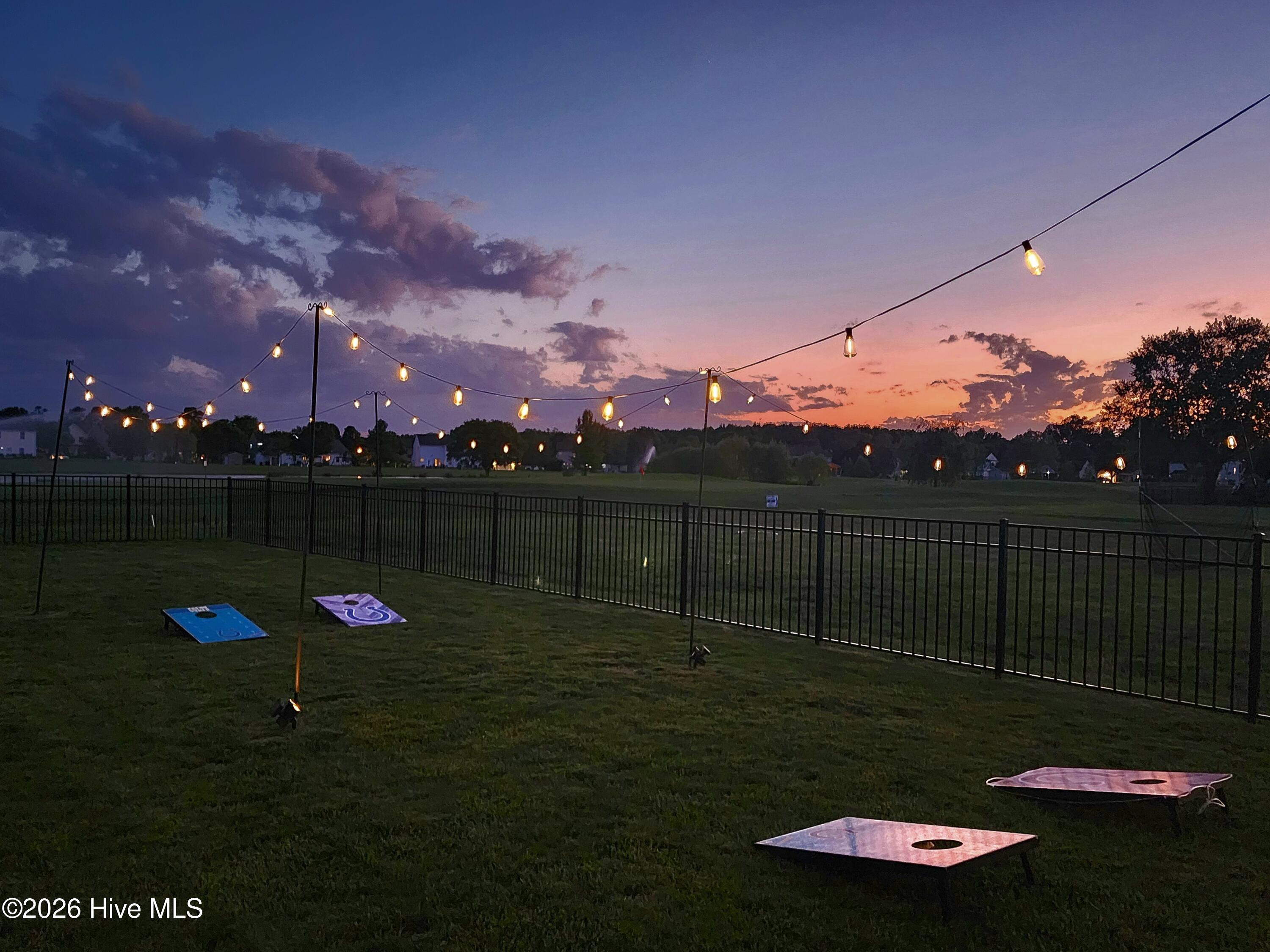 165 Green View Road Moyock, NC 27958 - Photo 41 of 60 Back Yard Lights in the Evening