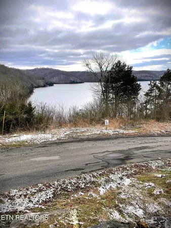 a view of a lake with beach