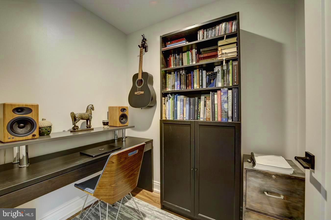 1111 Pennsylvania Ave. Southeast, Unit 409 Washington, DC 20003 - Photo 16 of 26 a view of walk in closet with clothes and shoes