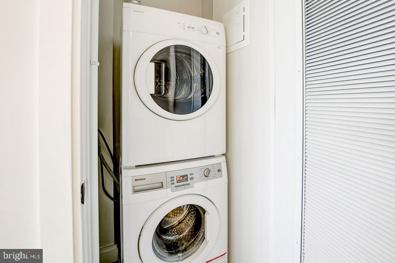 1111 Pennsylvania Ave. Southeast, Unit 409 Washington, DC 20003 - Photo 20 of 26 a utility room with dryer and washer