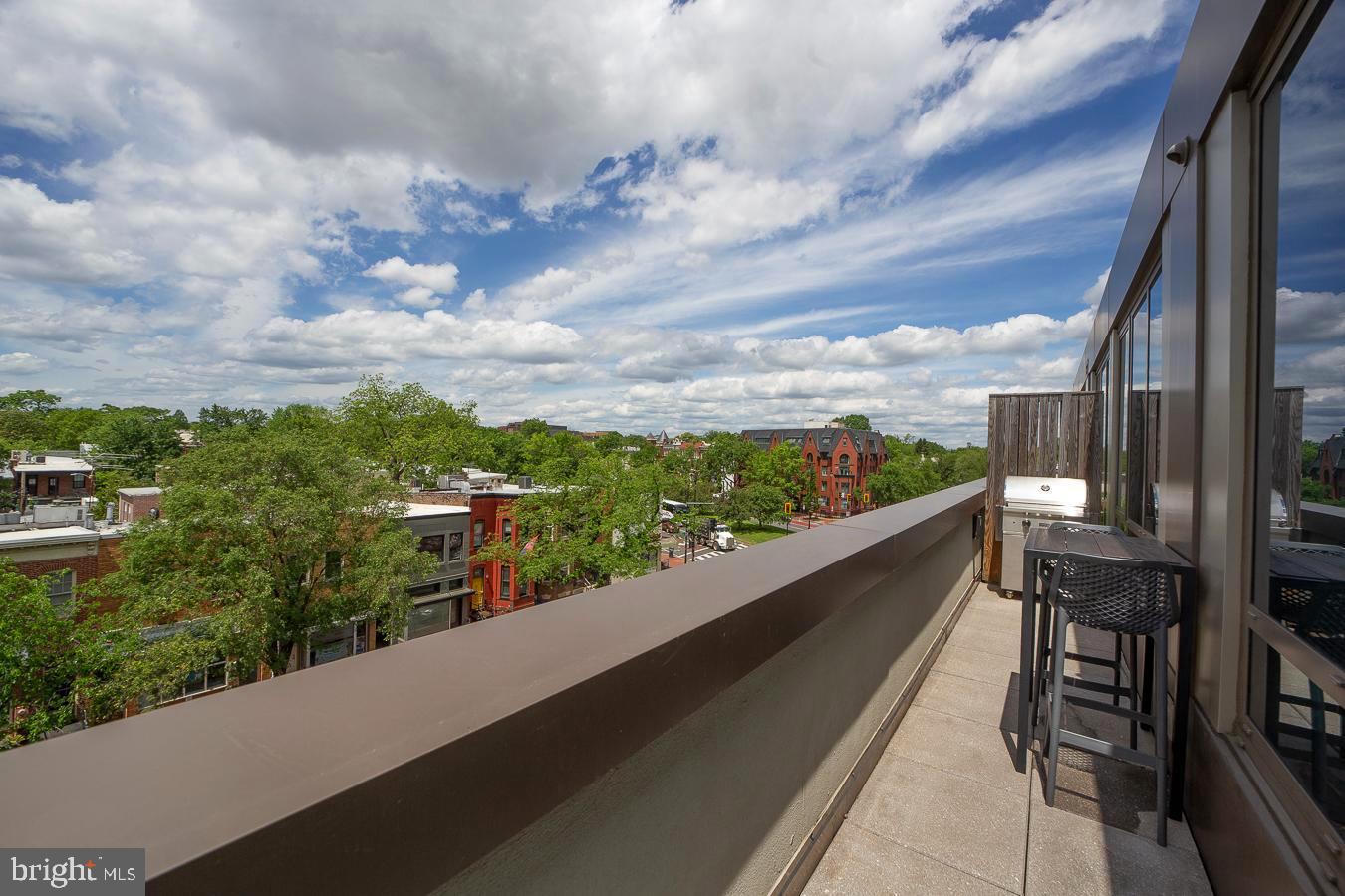 1111 Pennsylvania Ave. Southeast, Unit 409 Washington, DC 20003 - Photo 5 of 26 a view of balcony with furniture