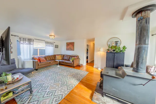a living room with furniture and a couch