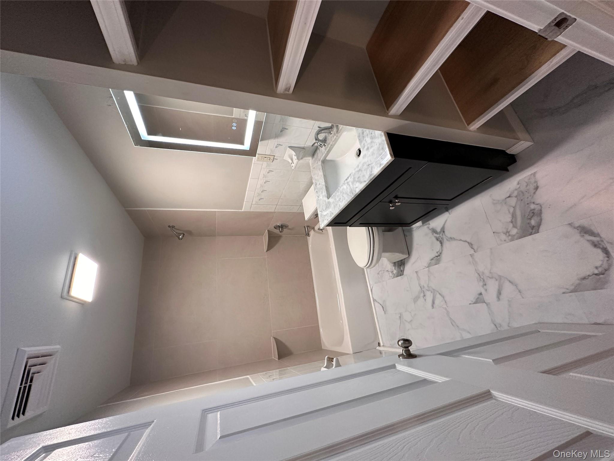 525 Plattekill Ardonia Road Wallkill, NY 12589 - Photo 20 of 25 a bathroom with a sink vanity and mirror