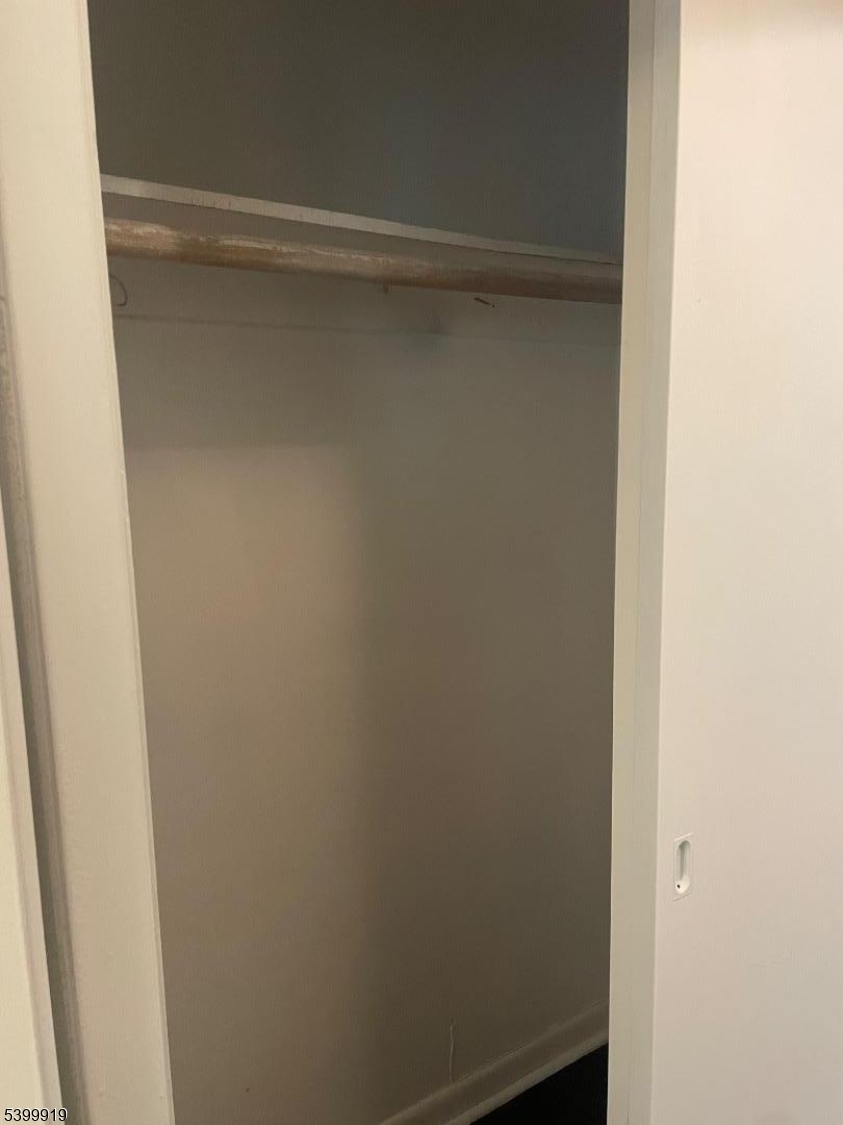 113 Hawthorne Avenue, Unit 2 Hawthorne, NJ 07506 - Photo 9 of 18 a view of an empty walk in closet