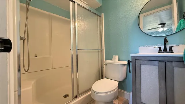 a bathroom with a toilet and a sink