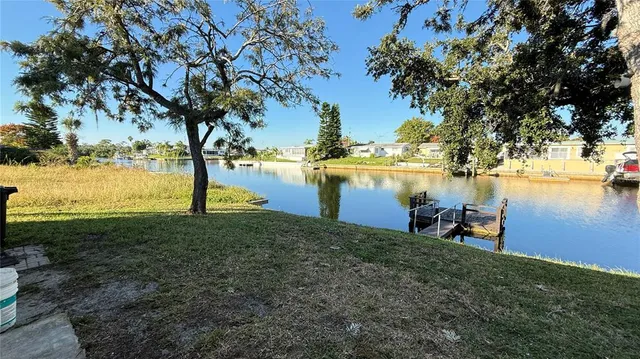 a lake view with a yard