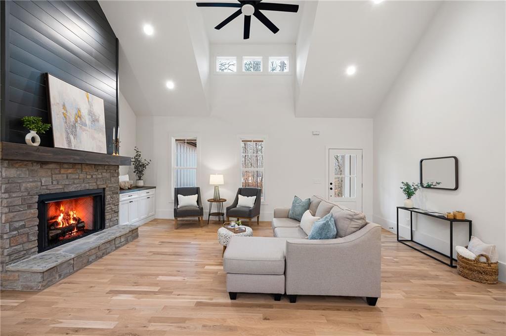 114 Folsom Road Northwest Adairsville, GA 30103 - Photo 4 of 20 a living room with furniture and a fireplace