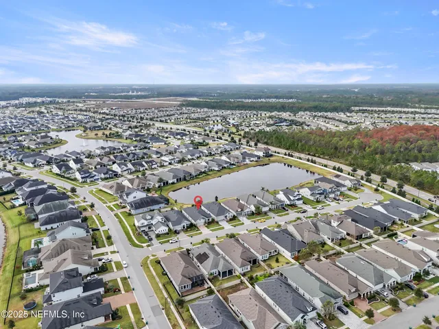 an aerial view of a city with lots of residential buildings
