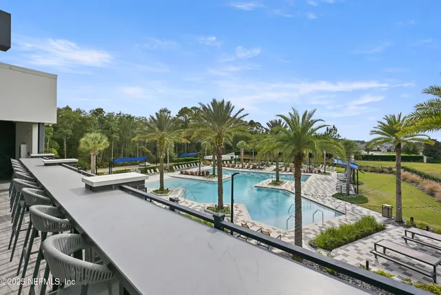 a table and chairs with the view of patio