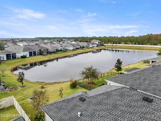 a view of a lake with a city