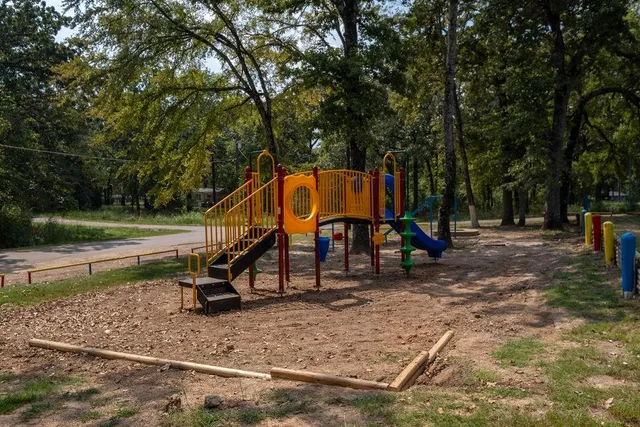 a view of park with a slide