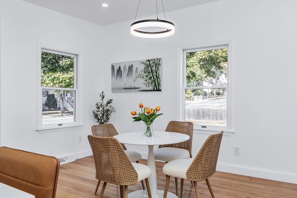 24 Ballard Street Saugus, MA 01906 - Photo 13 of 38 a view of a dining room with furniture window and outside view