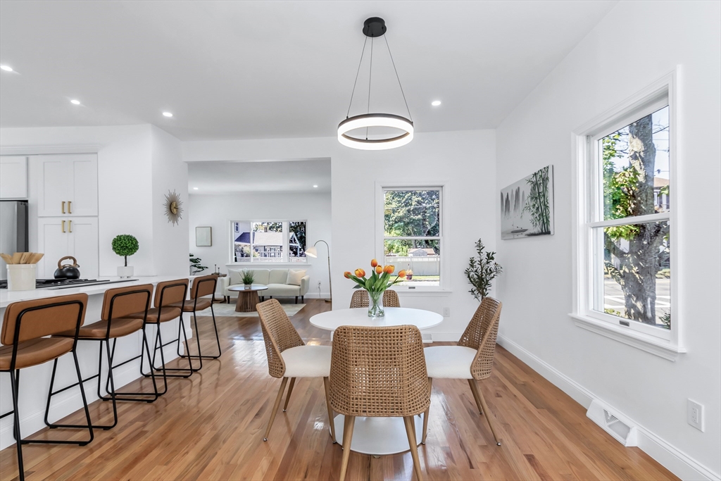 24 Ballard Street Saugus, MA 01906 - Photo 14 of 38 a view of a dining room with furniture and wooden floor