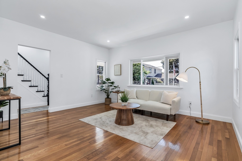 24 Ballard Street Saugus, MA 01906 - Photo 16 of 38 a living room with furniture and wooden floor