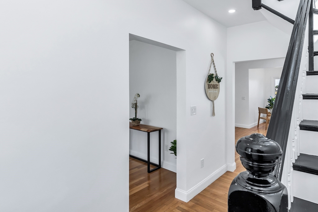 24 Ballard Street Saugus, MA 01906 - Photo 19 of 38 a view of entryway and hall with wooden floor