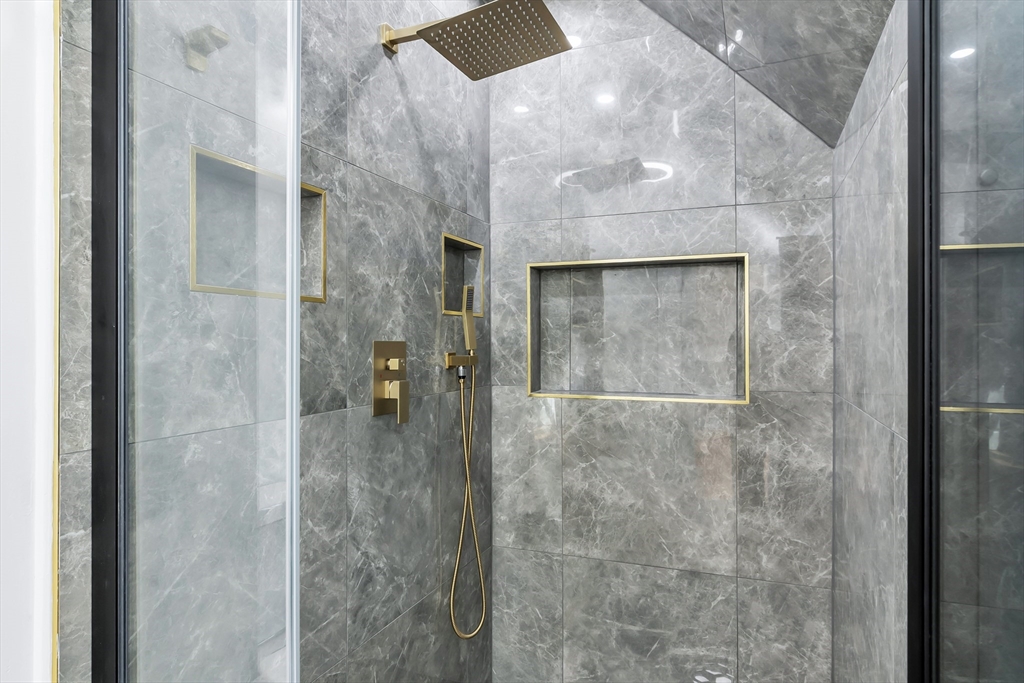 24 Ballard Street Saugus, MA 01906 - Photo 23 of 38 a bathroom with a shower