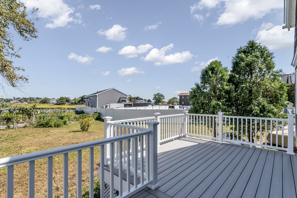 24 Ballard Street Saugus, MA 01906 - Photo 32 of 38 a view of a balcony with wooden floor