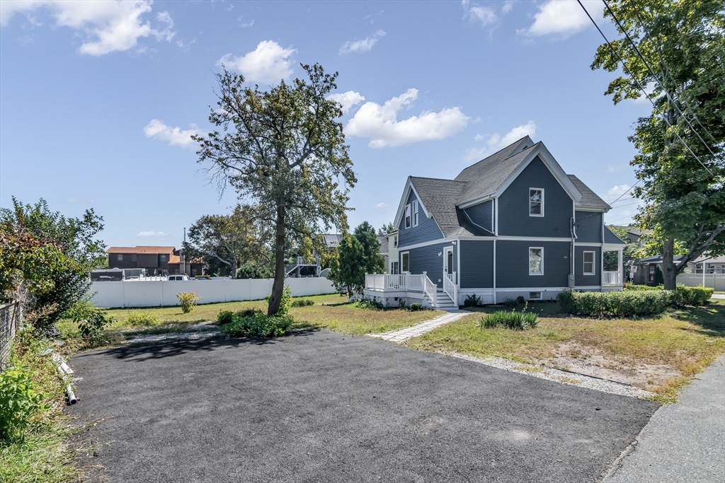 24 Ballard Street Saugus, MA 01906 - Photo 34 of 38 a front view of a house with garden