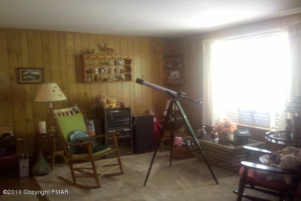 1101 Laurel Road Pocono Summit, PA 18346 - Photo 4 of 12 a view of a room with gym equipment