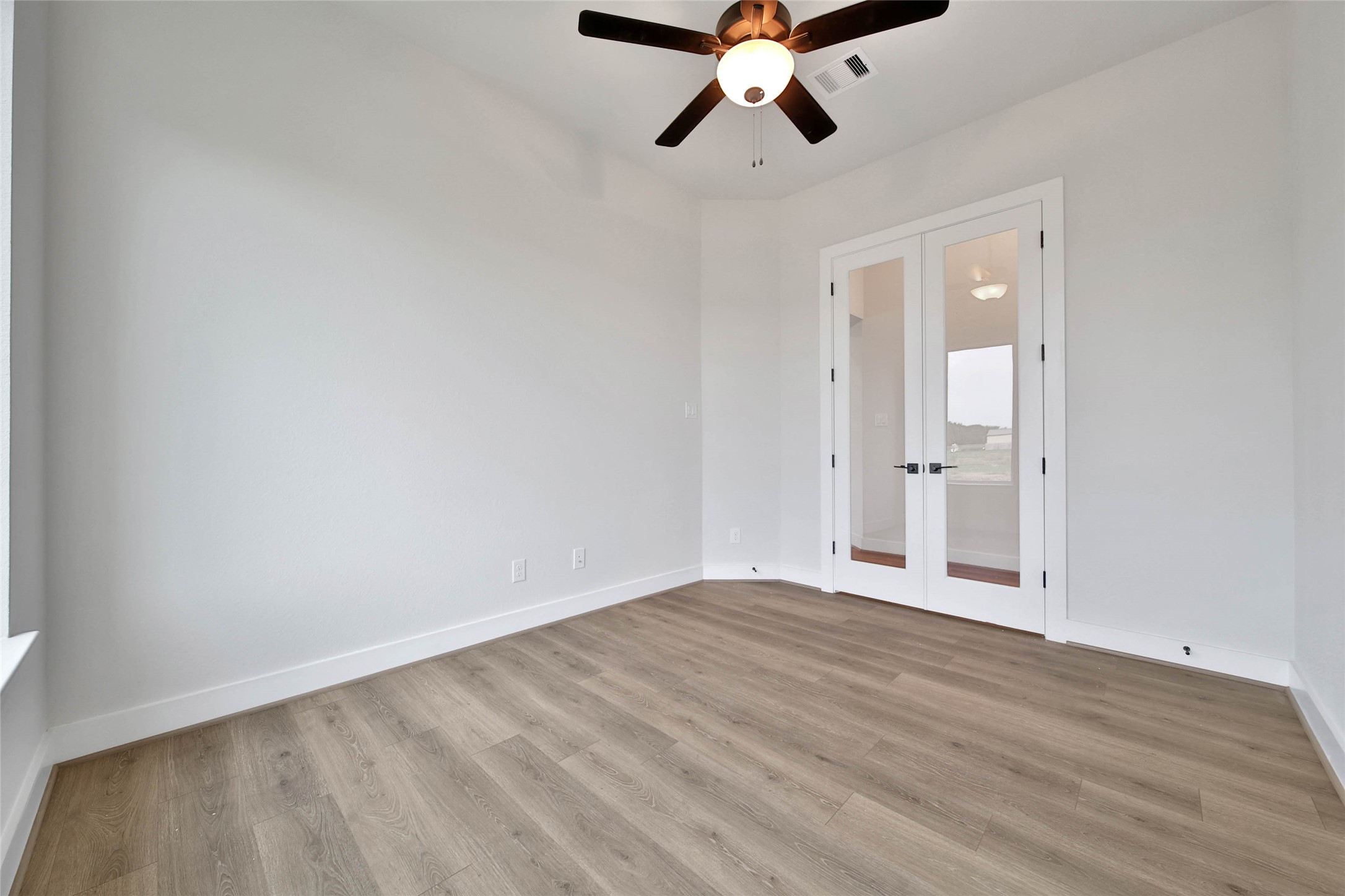 4610 Magnolia Bend Drive Rosharon, TX 77583 - Photo 27 of 48 wooden floor in an empty room