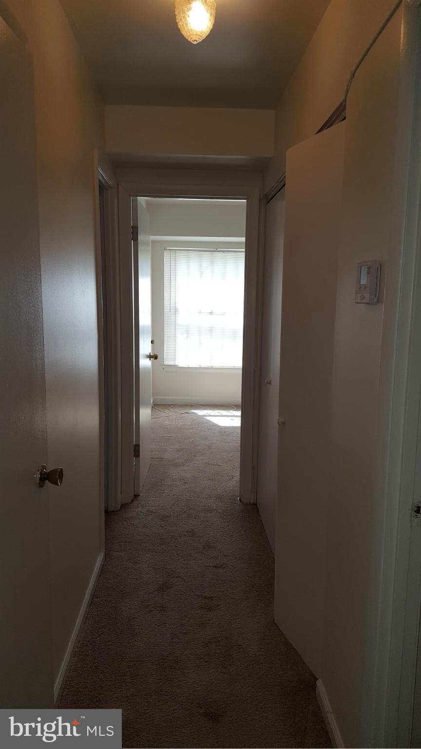 3845 St Barnabas Road, Unit T Suitland, MD 20746 - Photo 3 of 8 a view of a hallway