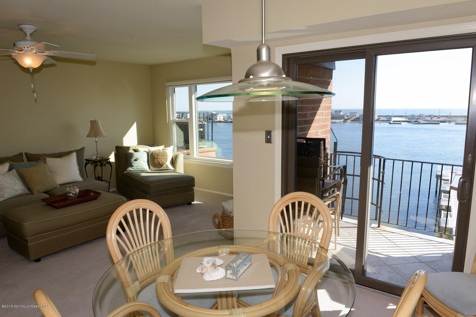 200 Portland Road, Unit A24 Highlands, NJ 07732 - Photo 3 of 30 a outdoor living space with furniture and a large window