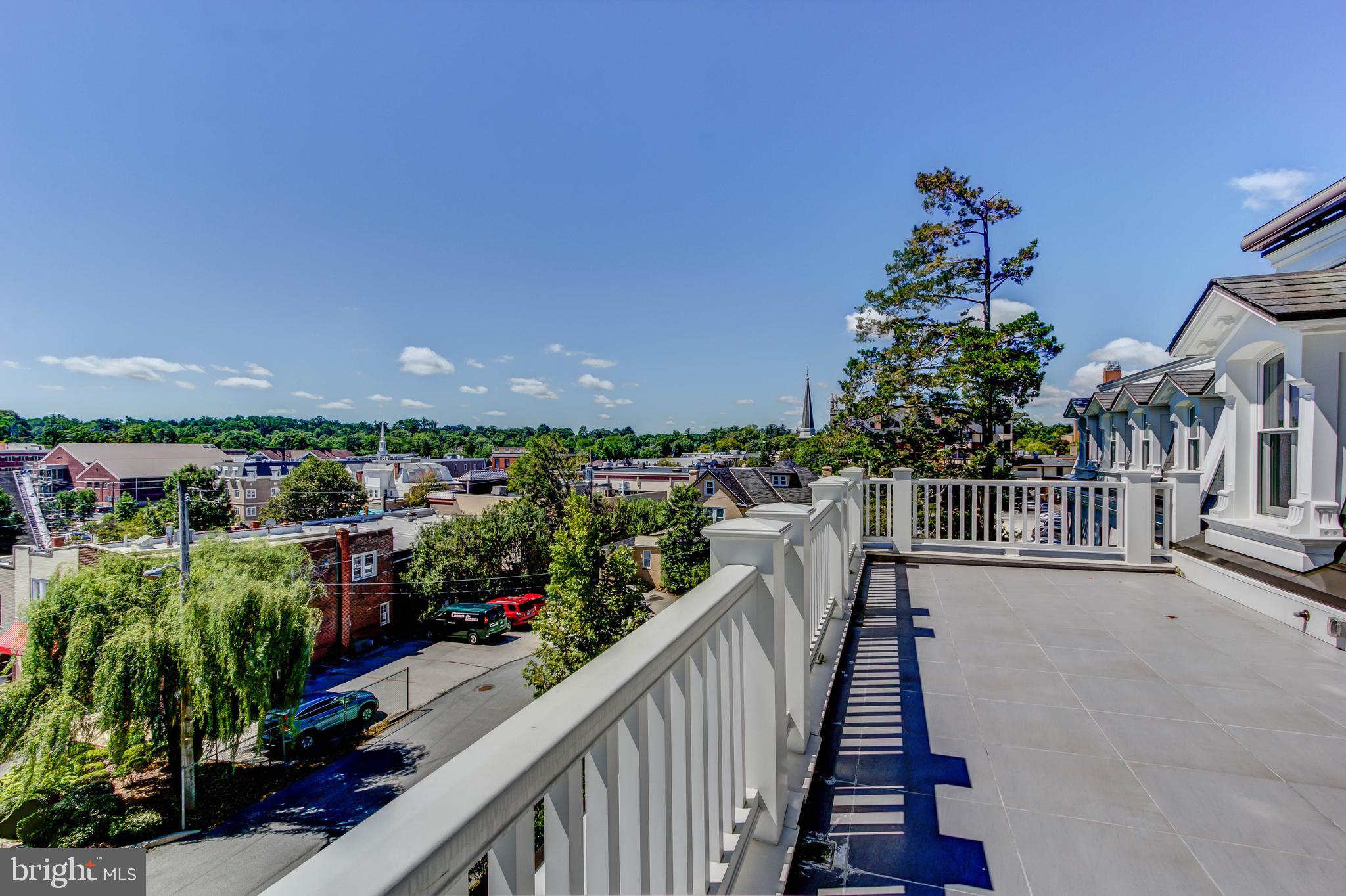 40 Louella Court, Unit C3/ D3 Wayne, PA 19087 - Photo 9 of 27 Patio overlooking downtown Wayne
