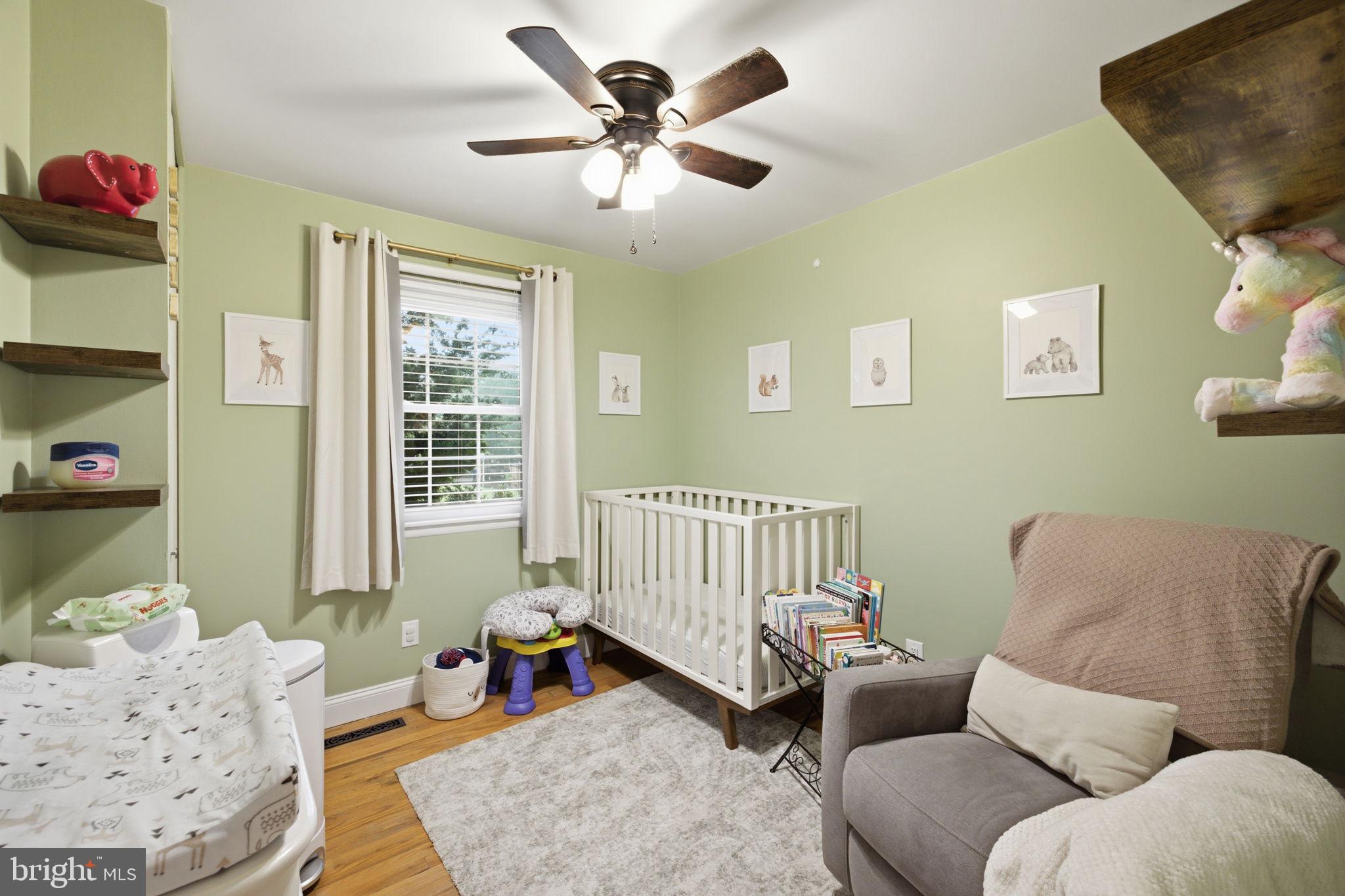 11937 Bayswater Road Gaithersburg, MD 20878 - Photo 19 of 55 Charming nursery with soft green hues.