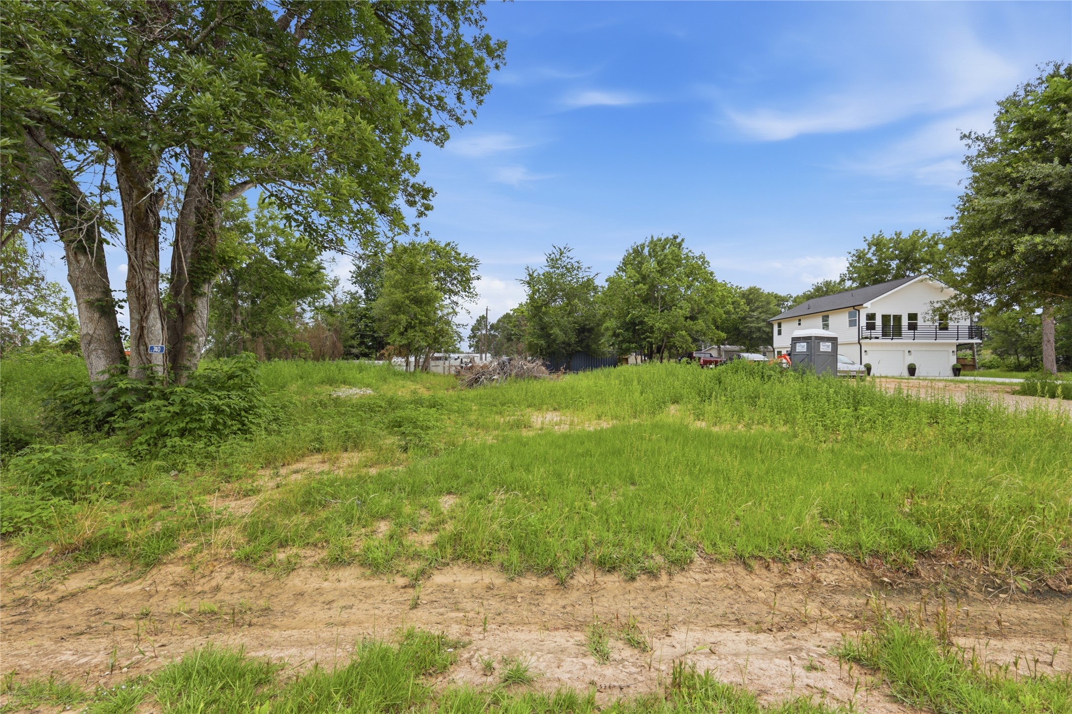 736-740 Azalea Street Prairie View, TX 77484 - Photo 6 of 20 a view of a city with lush green forest