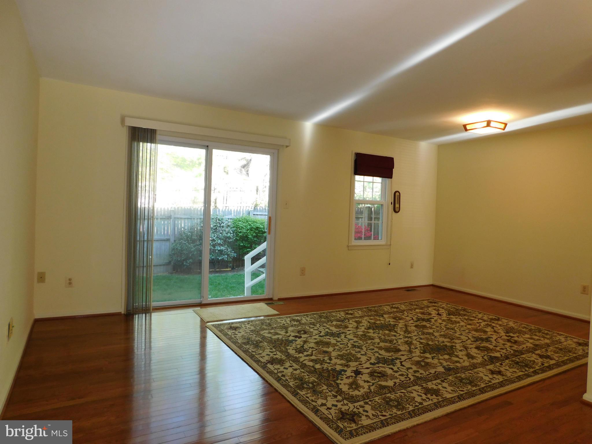 8565 Tyrolean Way Springfield, VA 22153 - Photo 4 of 19 LR & DR Combo w/ SGD to fenced yard
