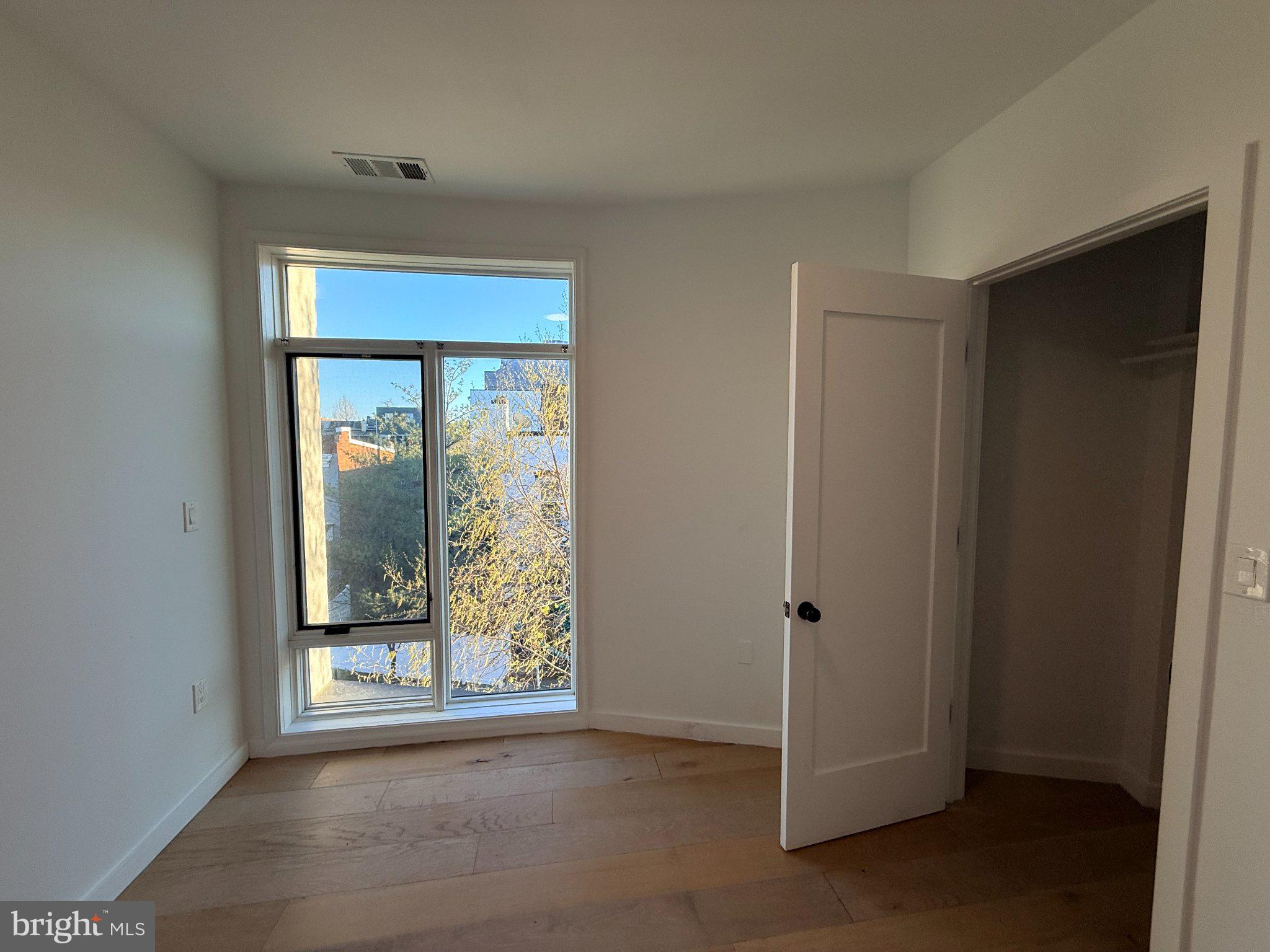 3601 14th Street Northwest, Unit 6 Washington, DC 20010 - Photo 13 of 26 an empty room with window