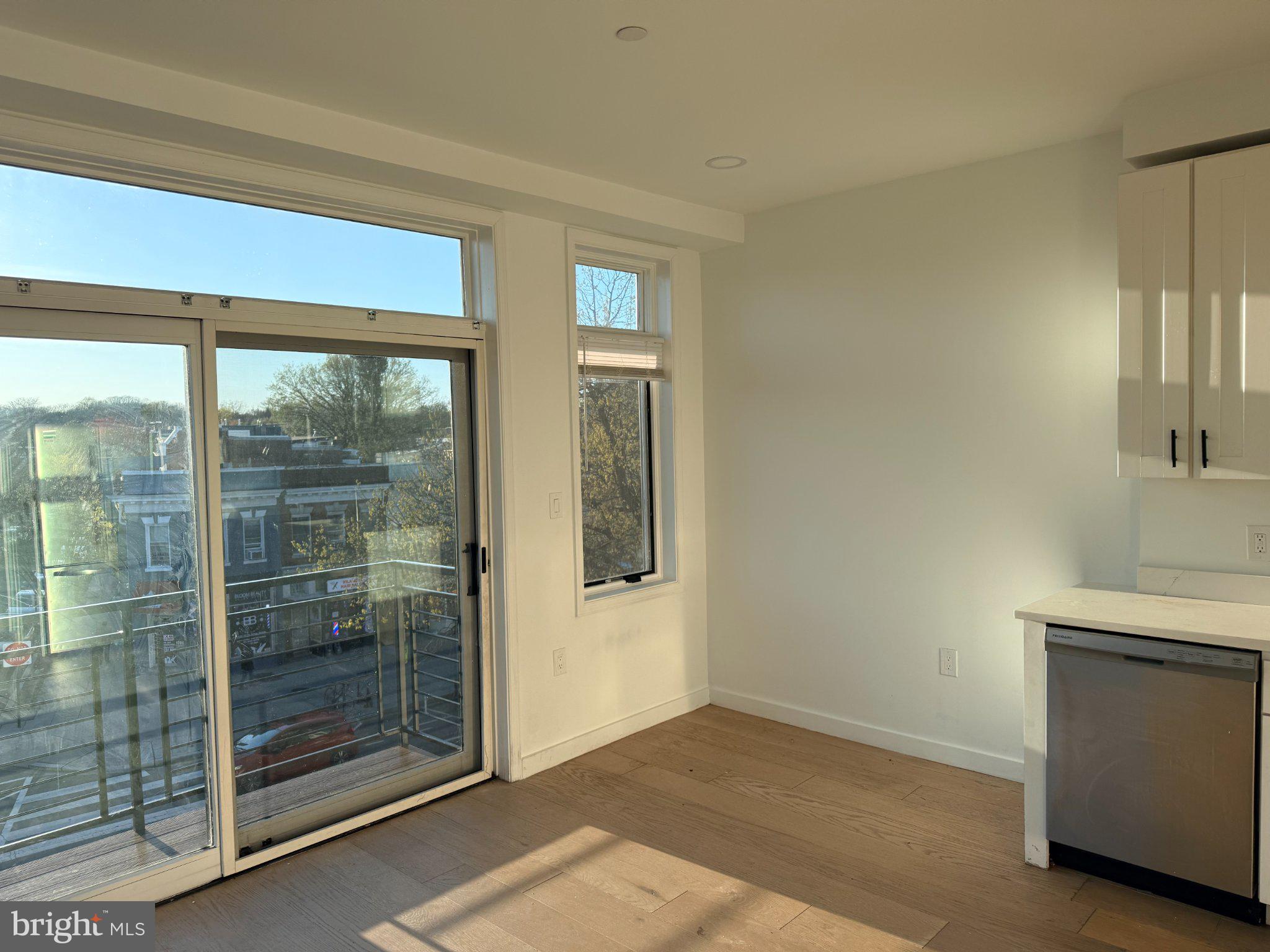 3601 14th Street Northwest, Unit 6 Washington, DC 20010 - Photo 4 of 26 a view of an empty room and window
