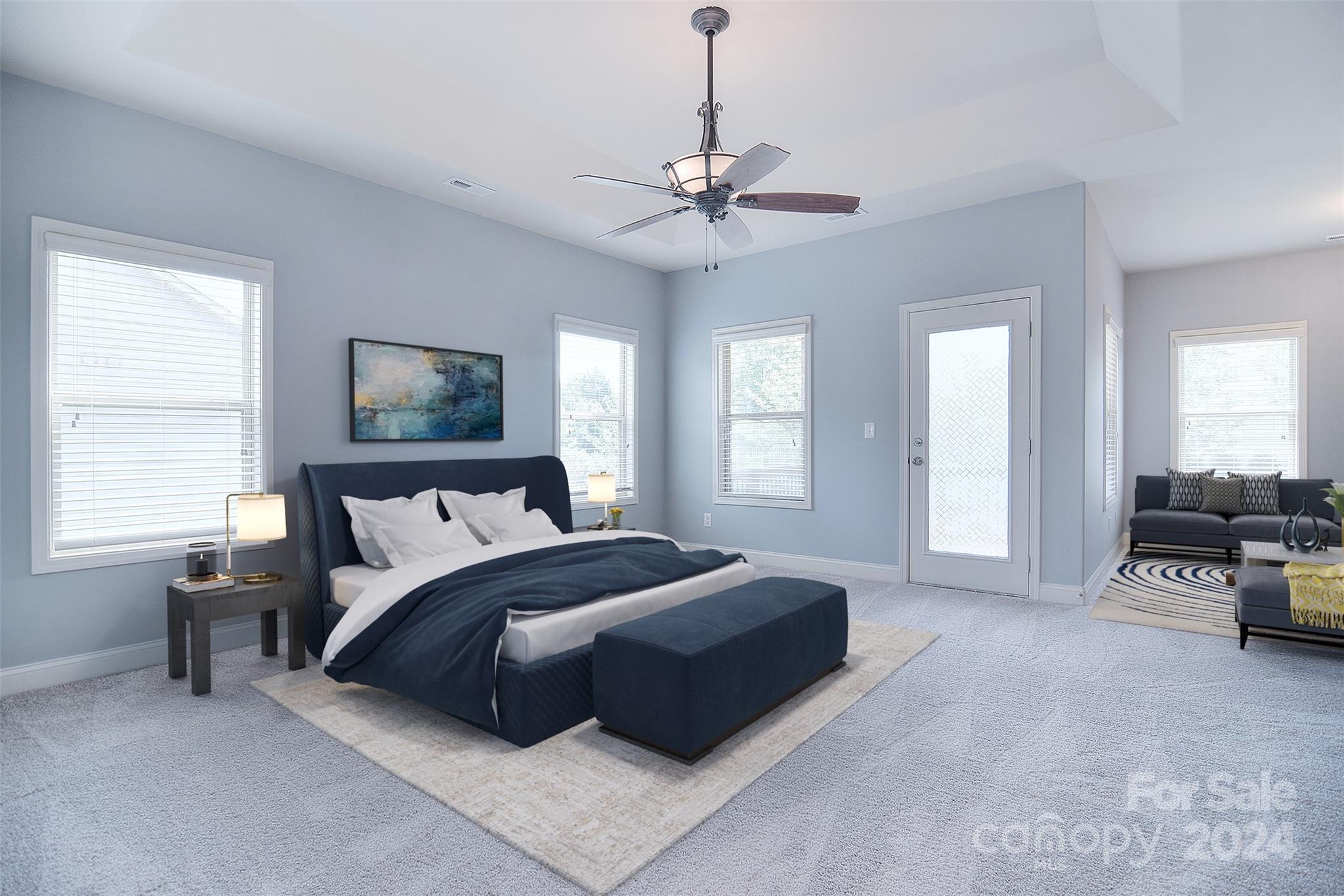 7004 Sedgewick Road Indian Trail, NC 28079 - Photo 15 of 38 a spacious bedroom with a bed a table and a couch