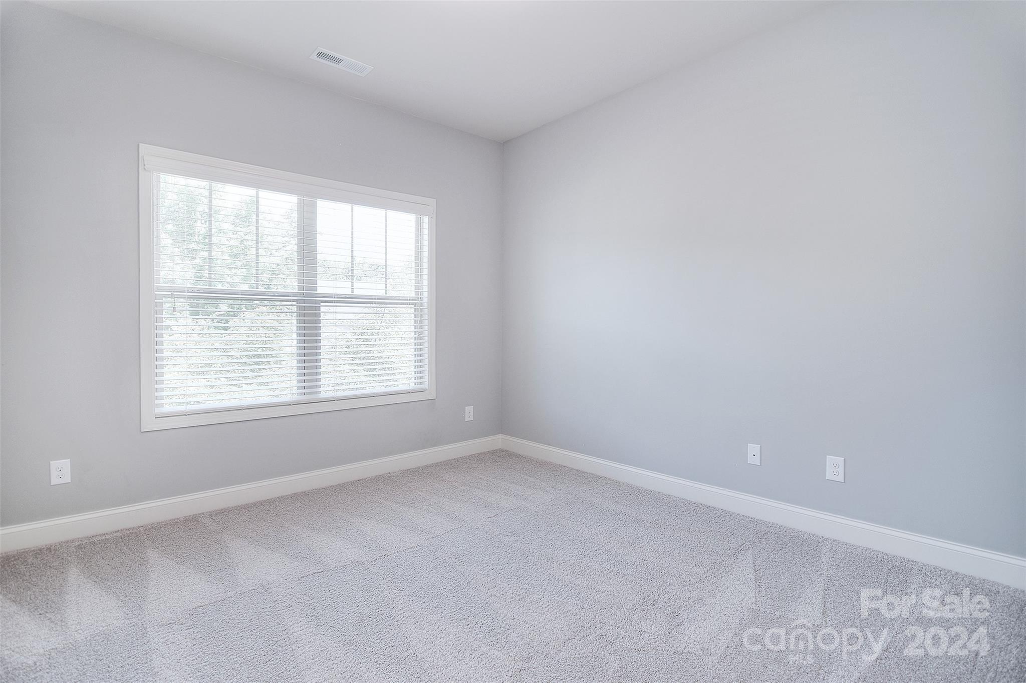 7004 Sedgewick Road Indian Trail, NC 28079 - Photo 22 of 38 an empty room with a window