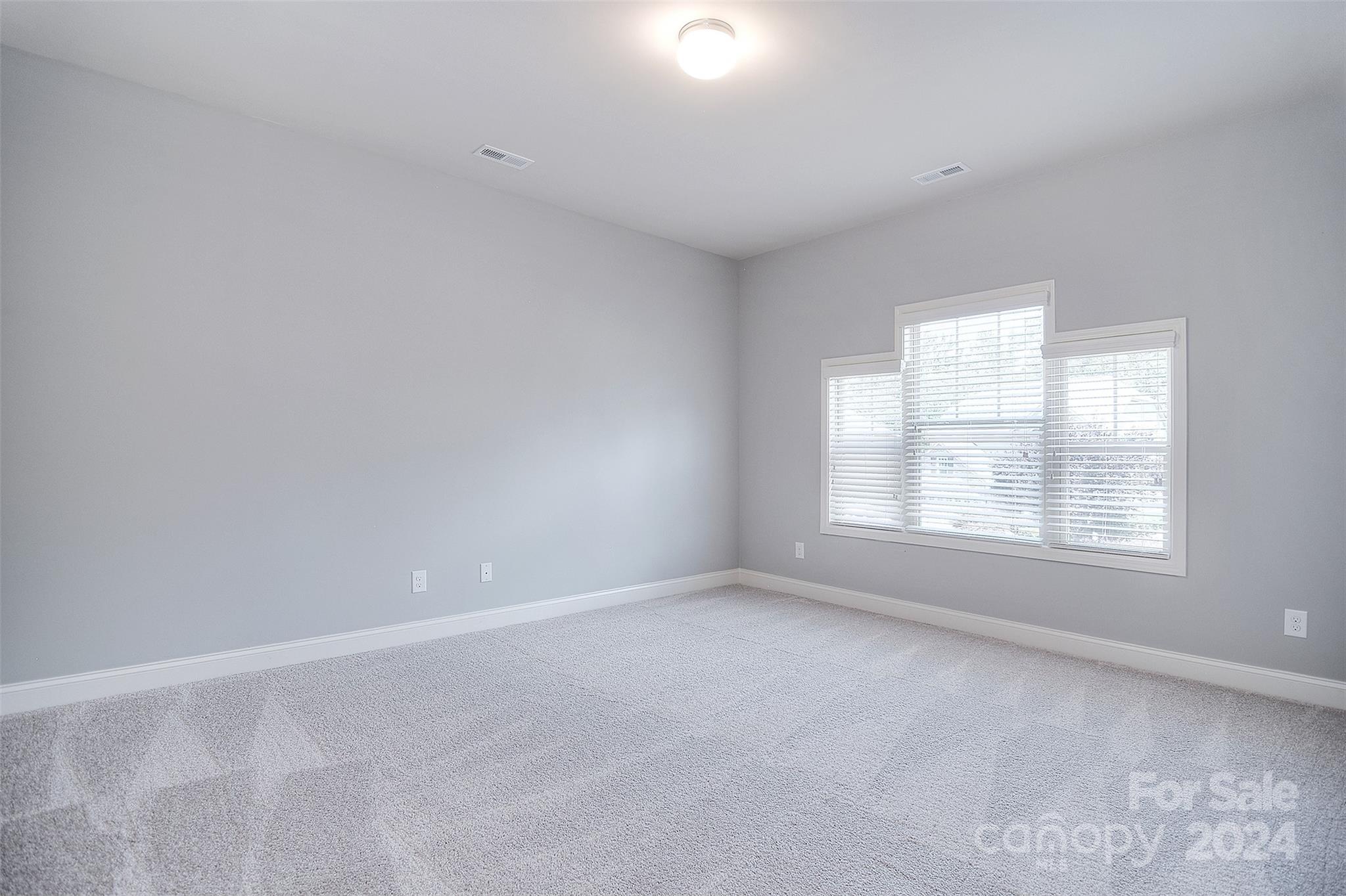 7004 Sedgewick Road Indian Trail, NC 28079 - Photo 23 of 38 an empty room with a window